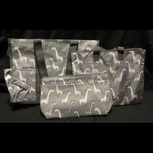 Brand new thirty-one Go-Go Giraffe diaper bag set.